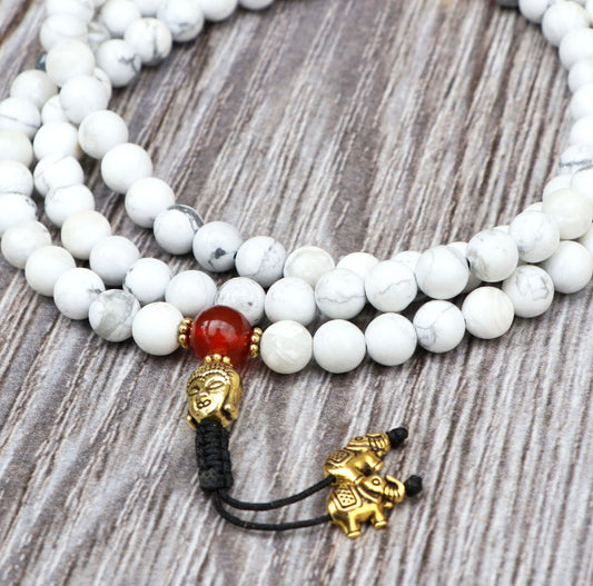 Collar Mala de Howlita Espiritual con Cabeza de Buda y Elefante – Calma y Sabiduría - Buddha Stones