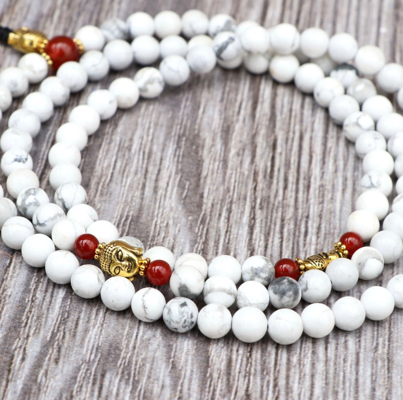 Collar Mala de Howlita Espiritual con Cabeza de Buda y Elefante – Calma y Sabiduría - Buddha Stones