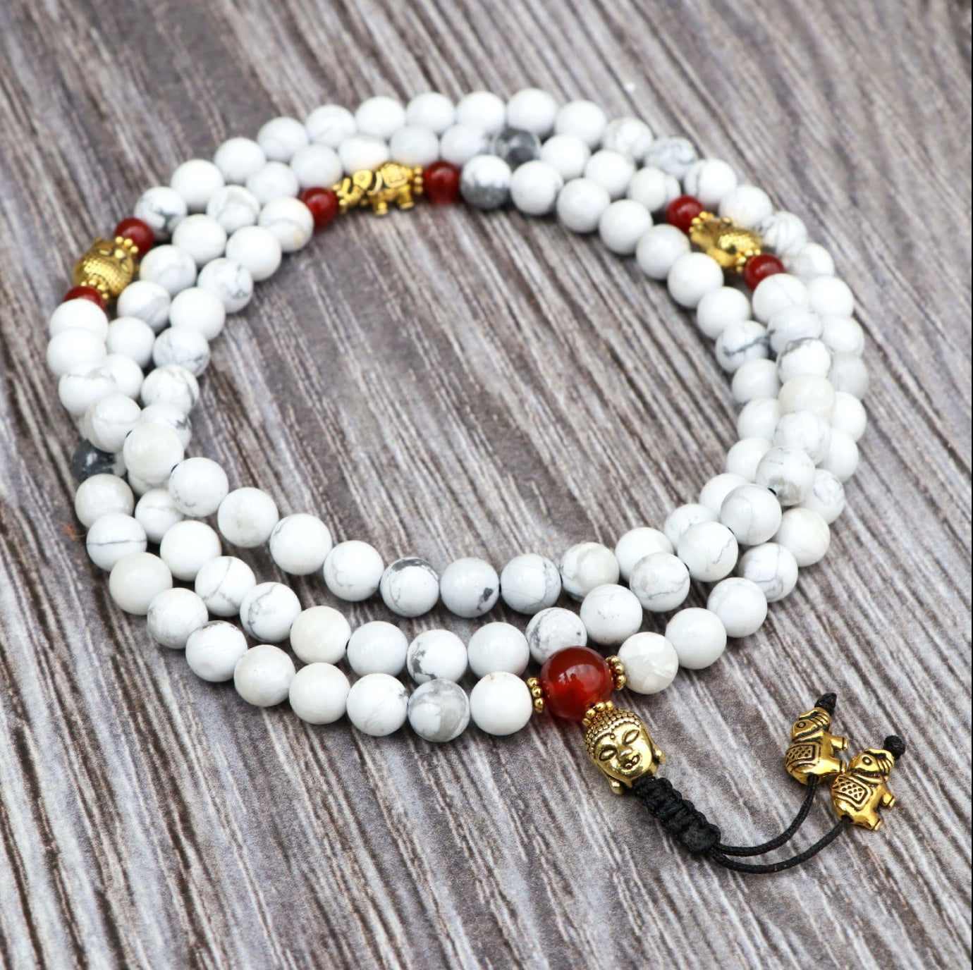 Collar Mala de Howlita Espiritual con Cabeza de Buda y Elefante – Calma y Sabiduría - Buddha Stones
